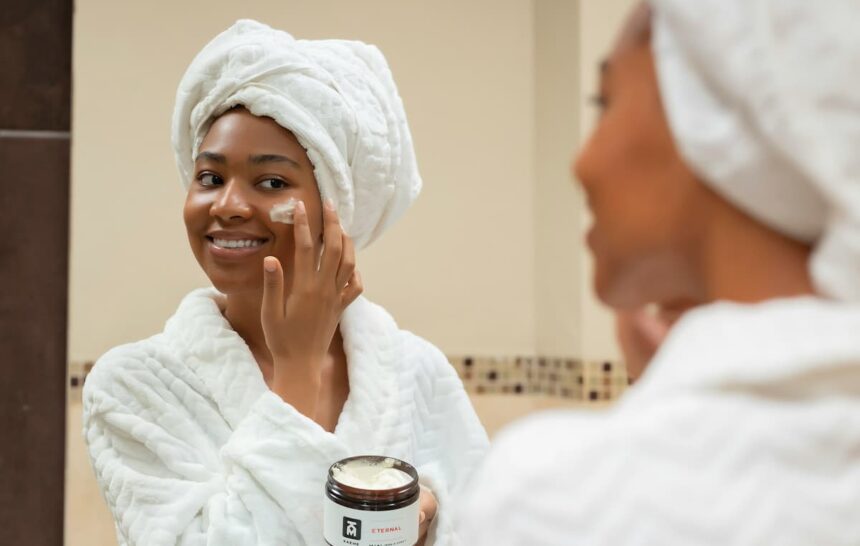 Woman applying a cream to counteract seasonal allergies
